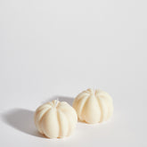 Two Boujie Small Pumpkin Decorative Candles side by side, handmade in soy wax with classic cream finish, styled for autumn home décor.